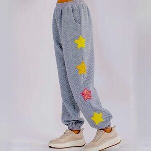 WOMEN'S ELASTIC WAIST FRONT POCKET SEQUINS STARS DETAILED SWEATPANTS Large